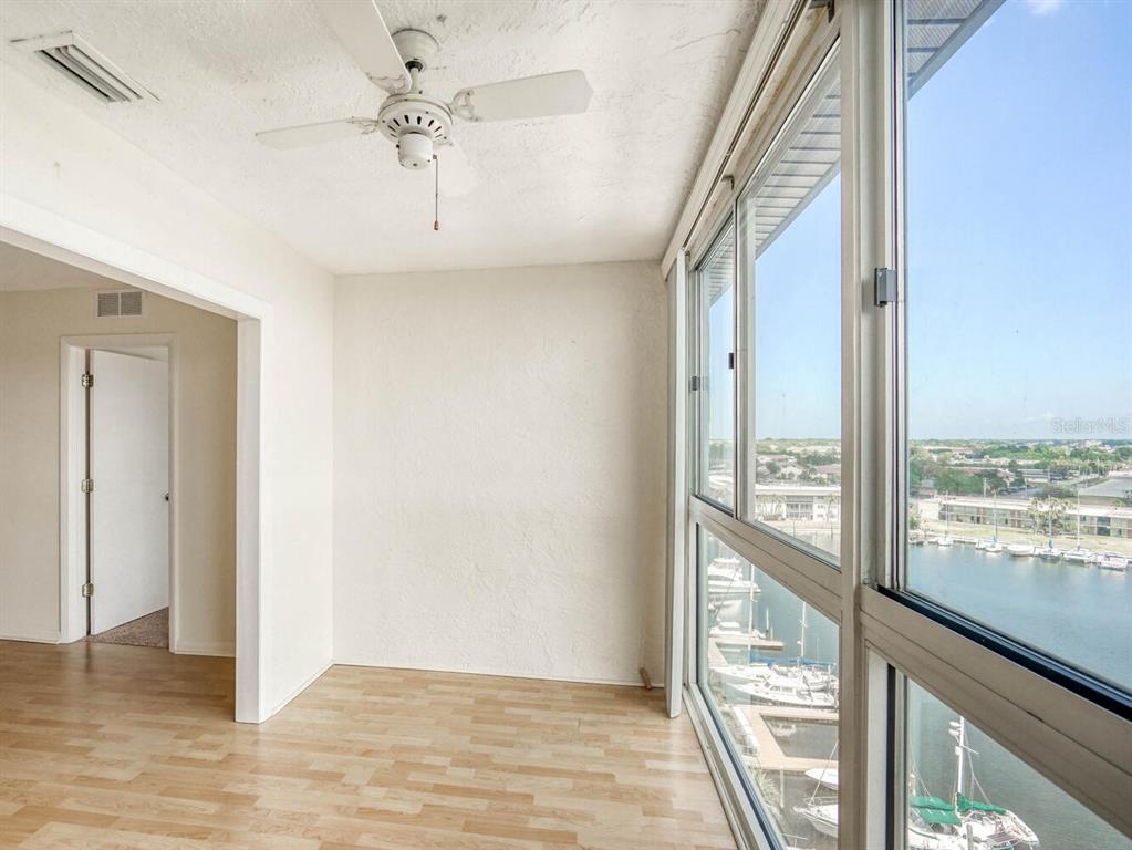 4939 Floramar Terrace, Unit 904 New Port Richey, FL 34652 - Photo 21 of 53 a view of an empty room with a window