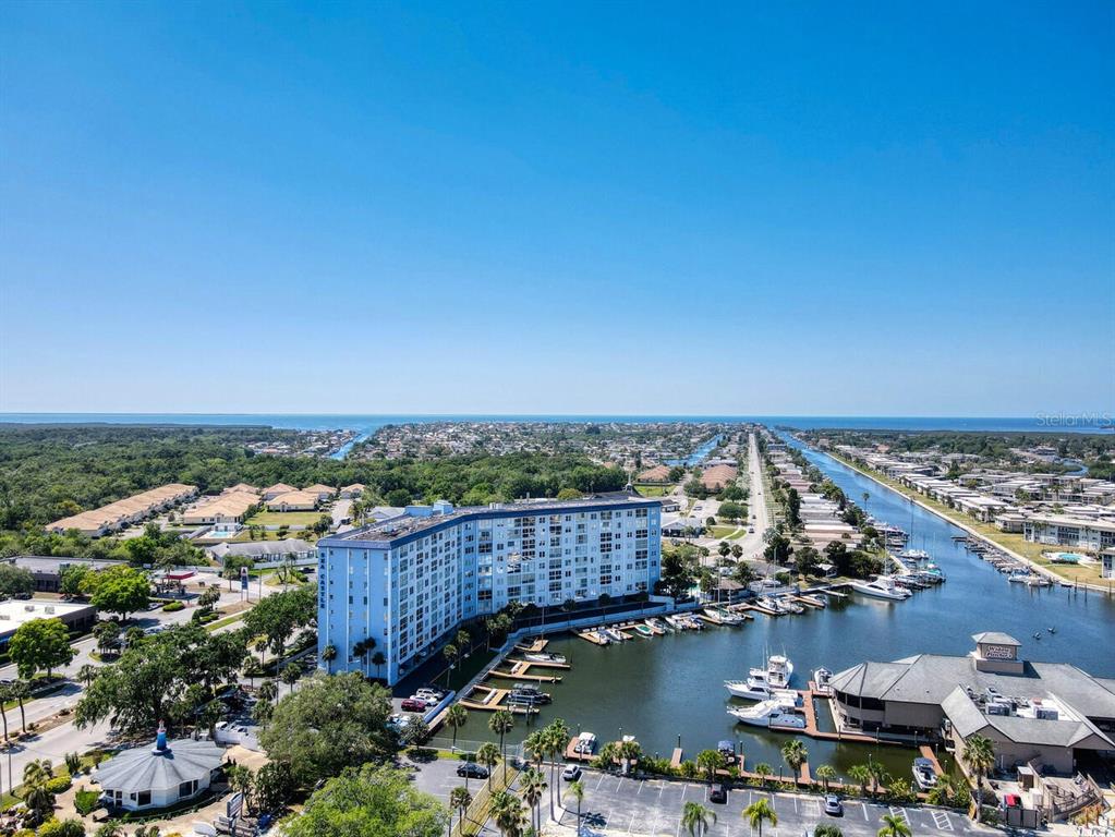 4939 Floramar Terrace, Unit 904 New Port Richey, FL 34652 - Photo 53 of 53 a view of a city and a lake view
