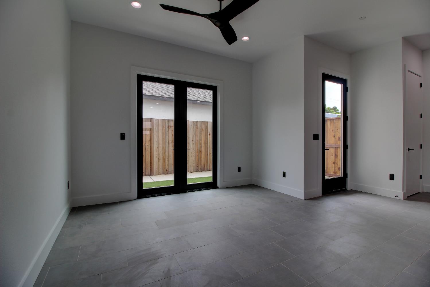 1526 3rd Street Escalon, CA 95320 - Photo 15 of 44 a view of an empty room with a window
