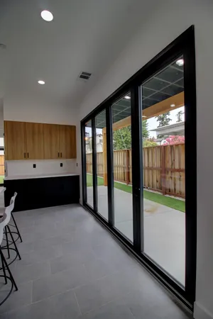 a view of a room with a large window