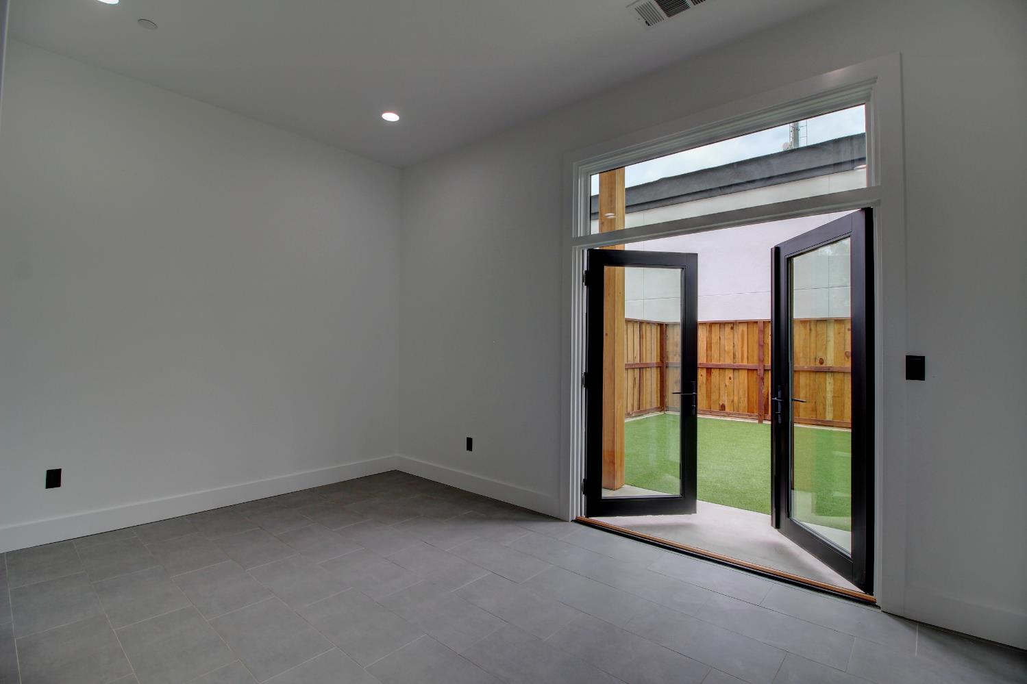 1526 3rd Street Escalon, CA 95320 - Photo 22 of 44 a view of an empty room with a window