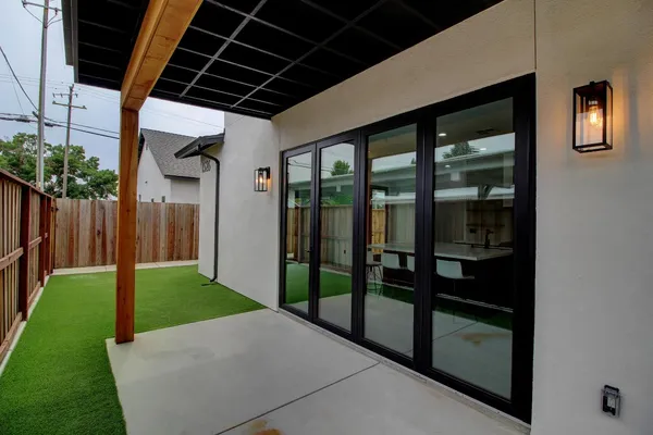 a view of backyard with green space