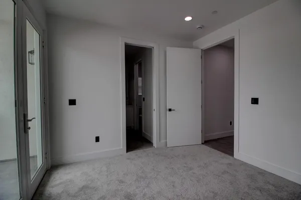 a bathroom with a double vanity sink and mirror