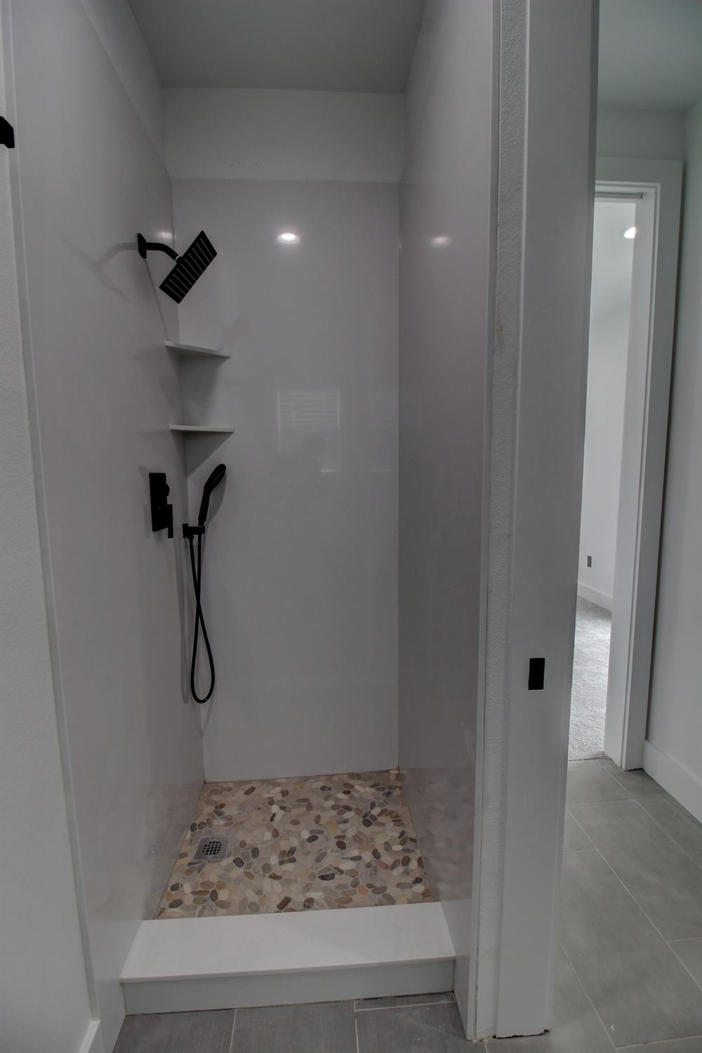 1526 3rd Street Escalon, CA 95320 - Photo 35 of 44 a bathroom with a shower