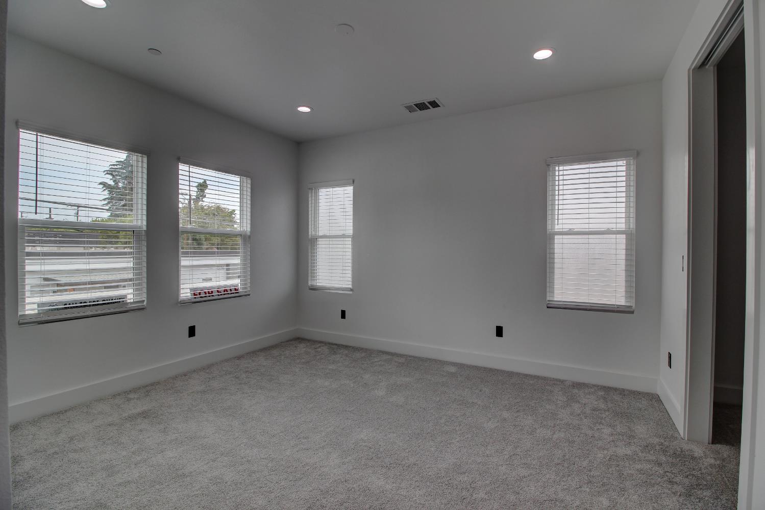 1526 3rd Street Escalon, CA 95320 - Photo 38 of 44 a view of an empty room with a window