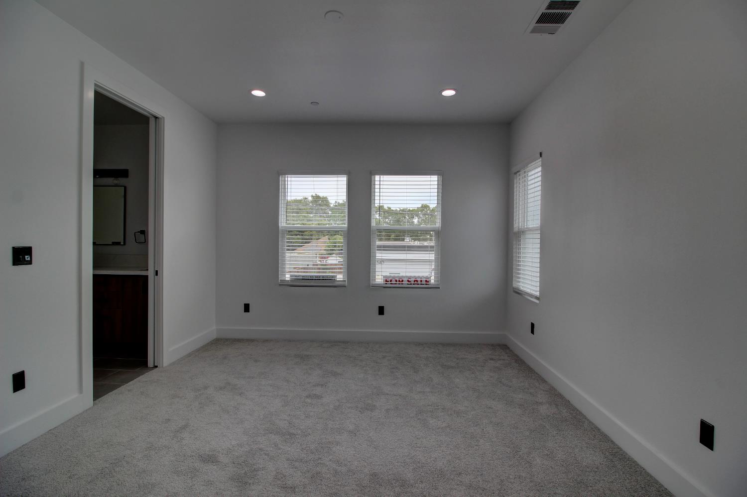 1526 3rd Street Escalon, CA 95320 - Photo 40 of 44 an empty room with windows