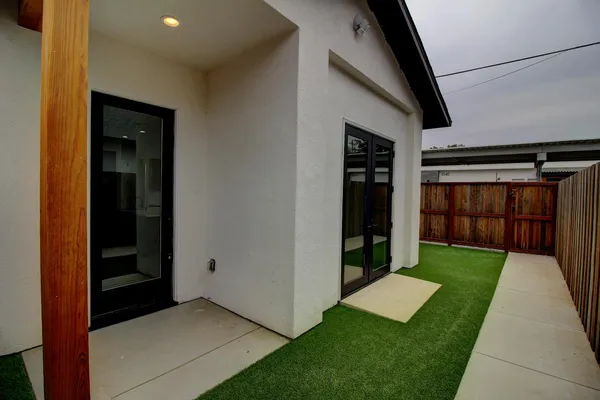a view of a porch in front of a house