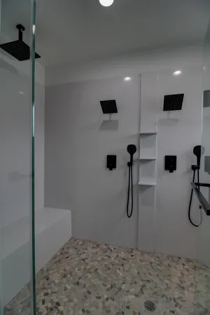 a bathroom with a double vanity sink mirror and double