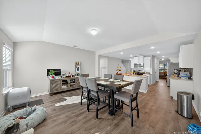 a view of a dining room with furniture
