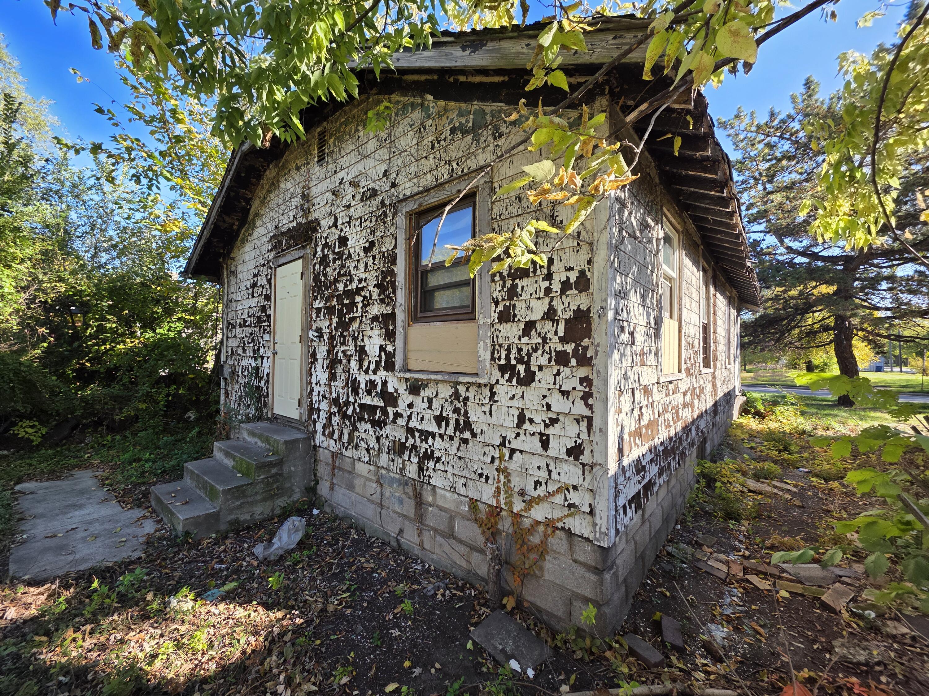 772 Ohio Street Gary, IN 46402 - Photo 3 of 22 a pathway of a house with a yard