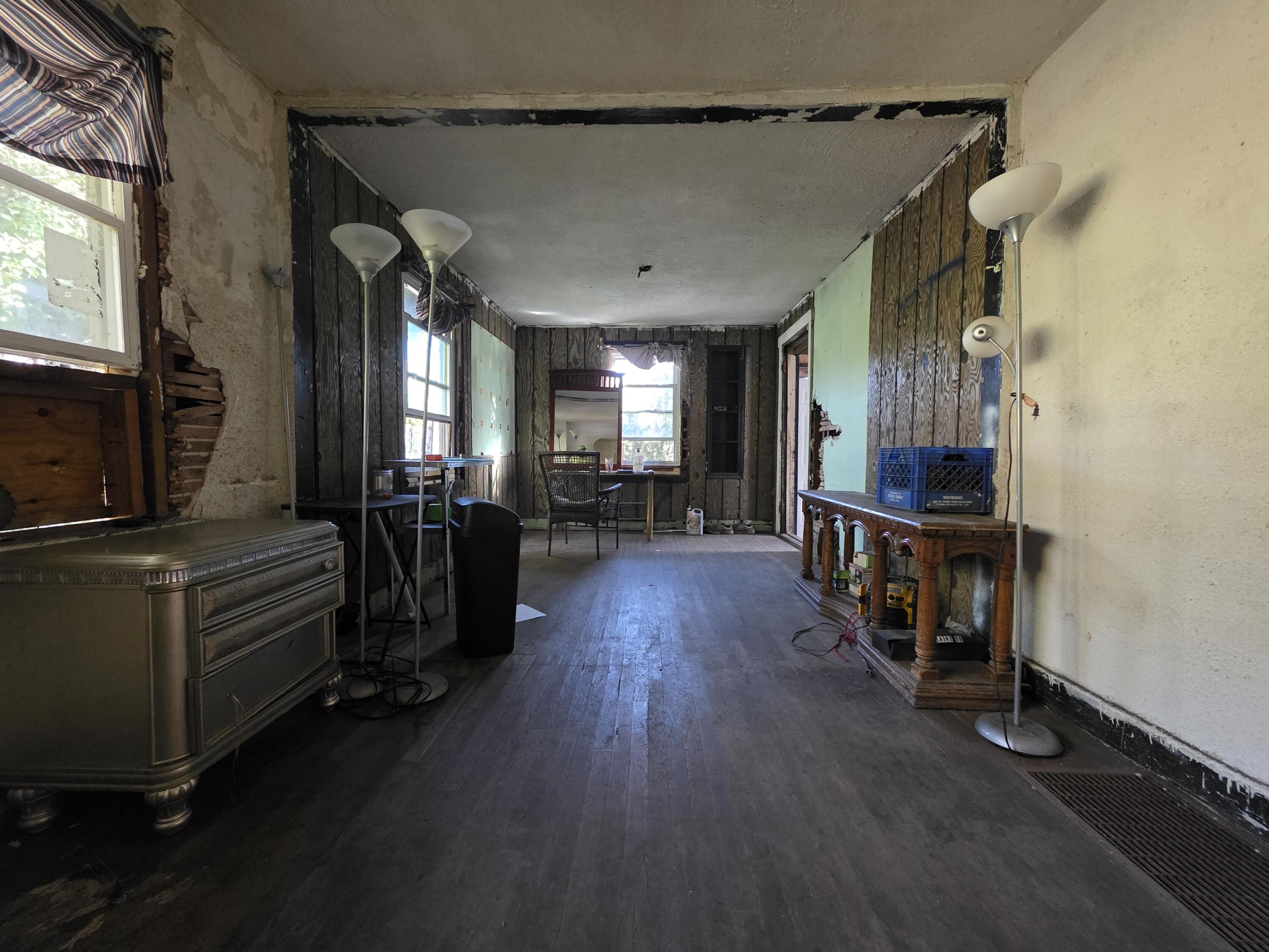 772 Ohio Street Gary, IN 46402 - Photo 4 of 22 a living room with furniture and a flat screen tv