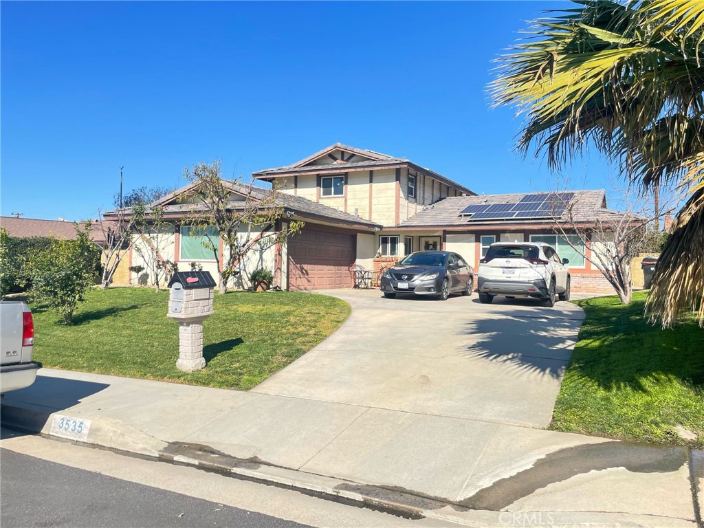 3535 Dixie Lane Riverside, CA 92503 - Photo 1 of 1 a front view of a house with garden