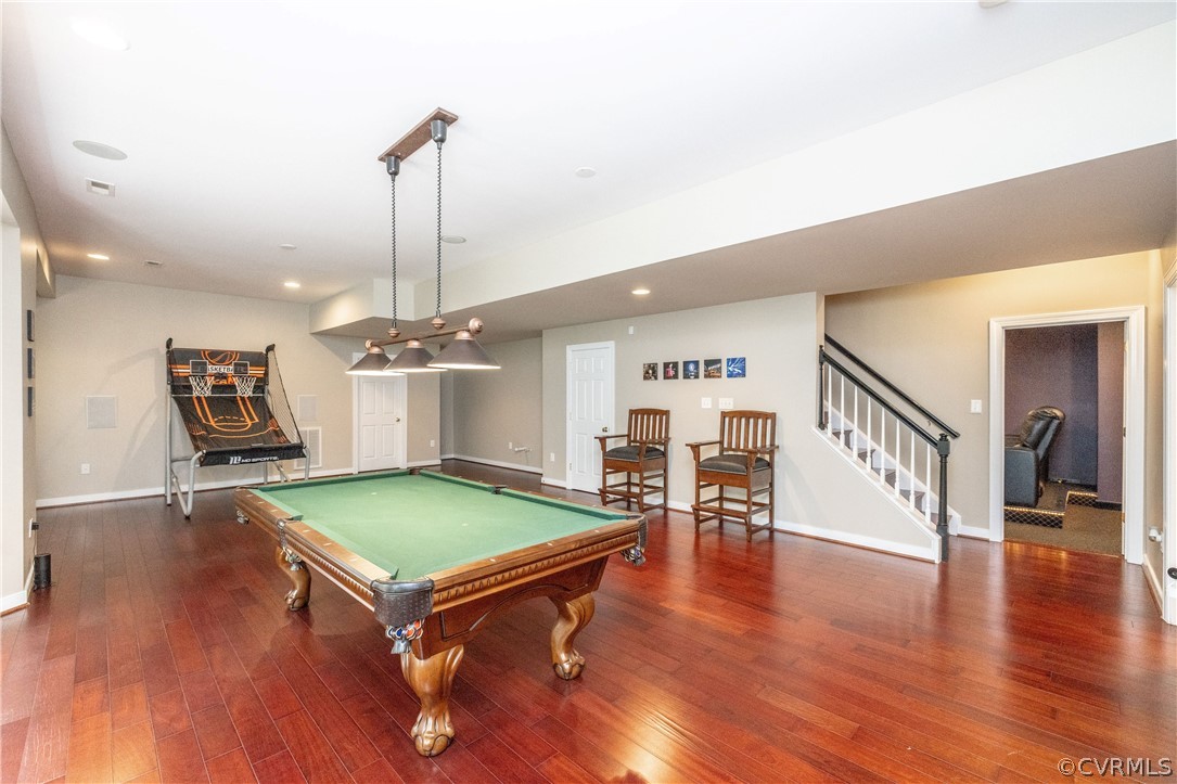 13201 Tipple Point Road Midlothian, VA 23114 - Photo 35 of 50 a room with lots of furniture and wooden floors