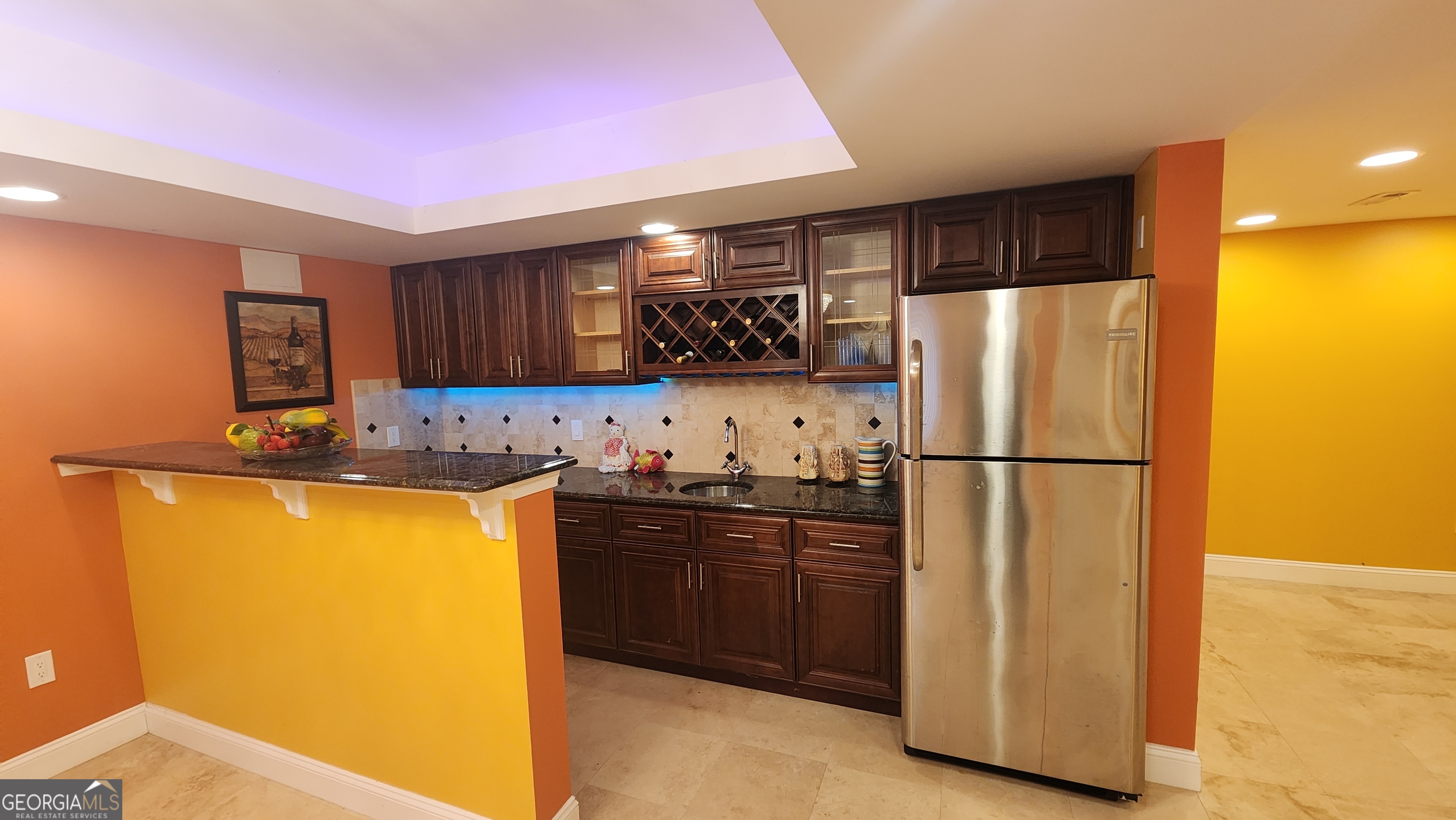 12123 Edgewater Drive Hampton, GA 30228 - Photo 35 of 44 a kitchen with stainless steel appliances granite countertop a refrigerator a sink and a stove