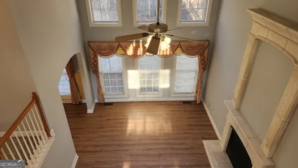 a kitchen with a sink and a microwave