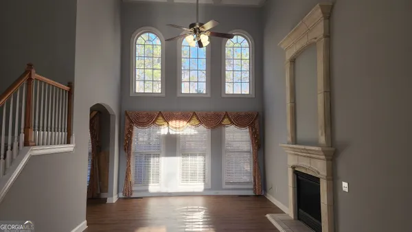 a kitchen with stainless steel appliances a refrigerator and a stove top oven