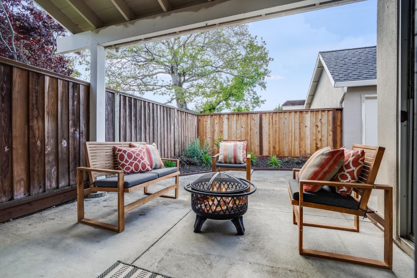 713 Comet Drive Foster City, CA 94404 - Photo 20 of 26 a backyard of a house with barbeque oven table and chairs