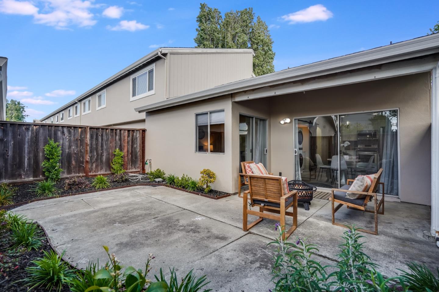 713 Comet Drive Foster City, CA 94404 - Photo 21 of 26 a view of a house with backyard and sitting area