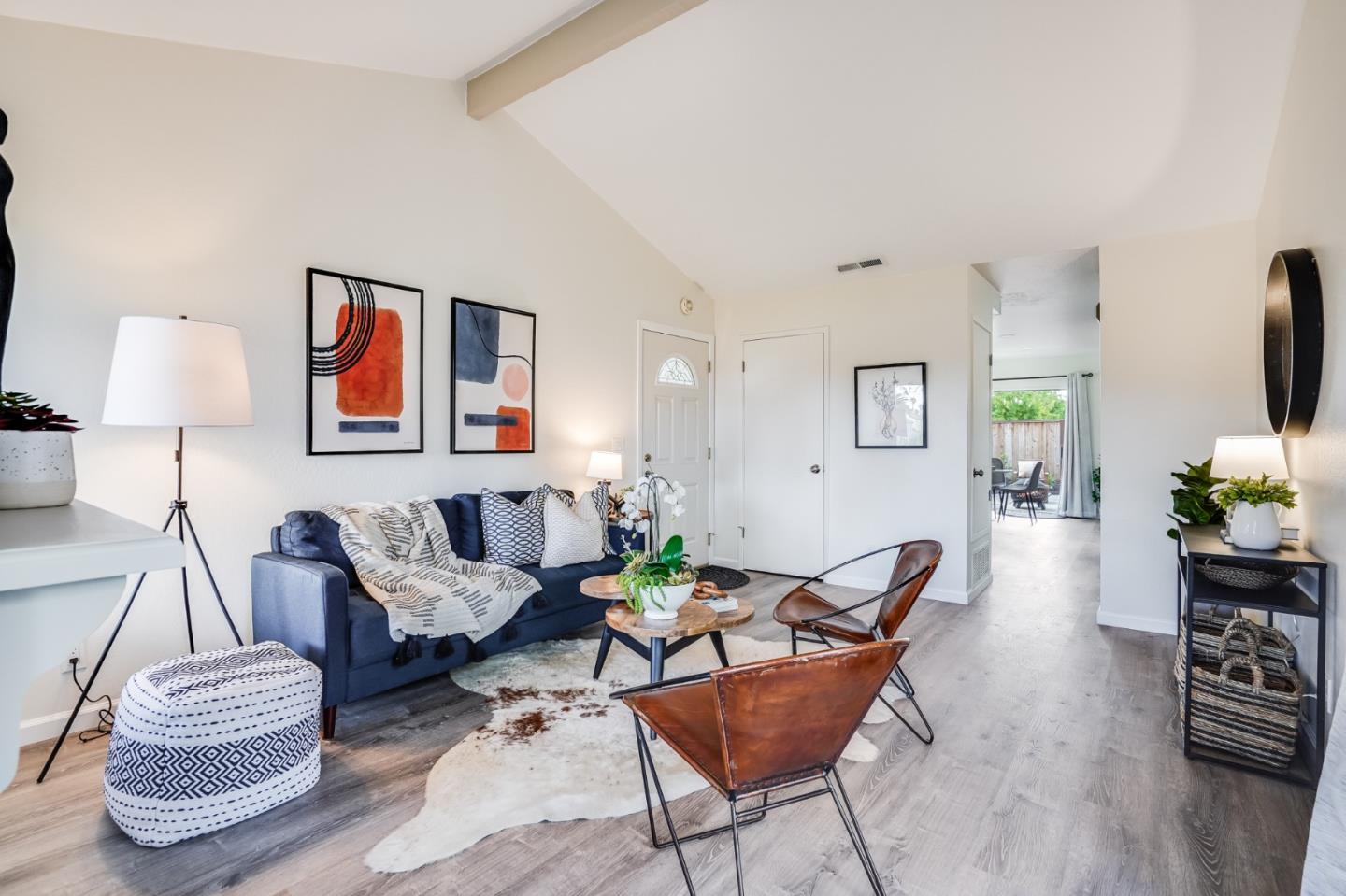 713 Comet Drive Foster City, CA 94404 - Photo 6 of 26 a living room with furniture and a wooden floor