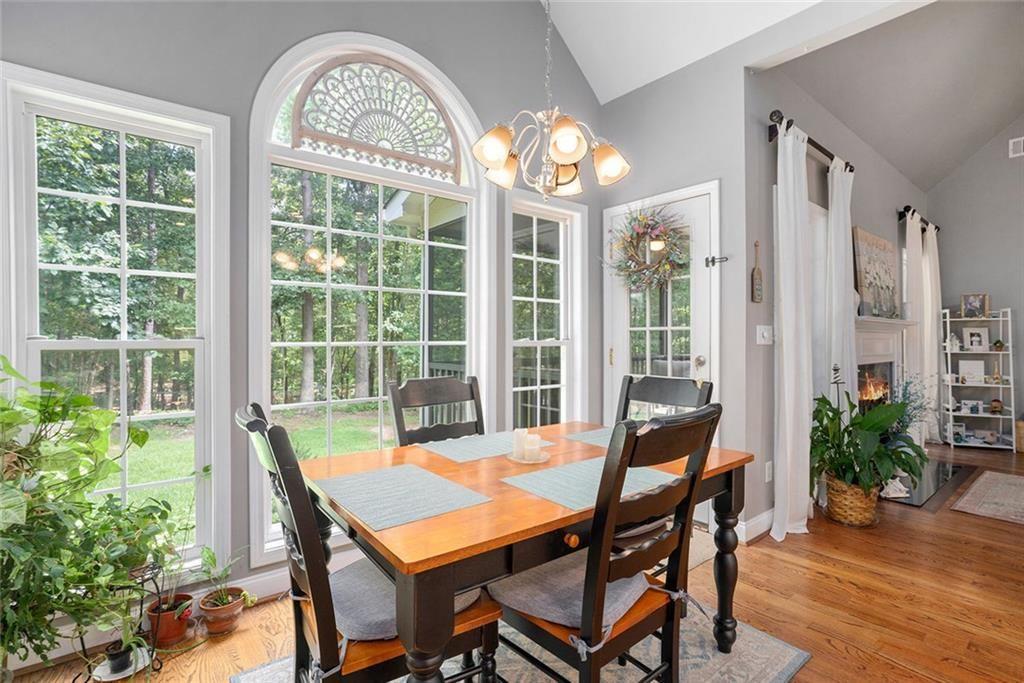 3792 Falls Trail Winston, GA 30187 - Photo 12 of 33 a view of a dining room with furniture window and wooden floor