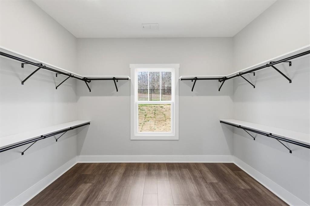 139 Old Alabama Road Southeast Emerson, GA 30137 - Photo 18 of 50 a view of a room with wooden floors and a window