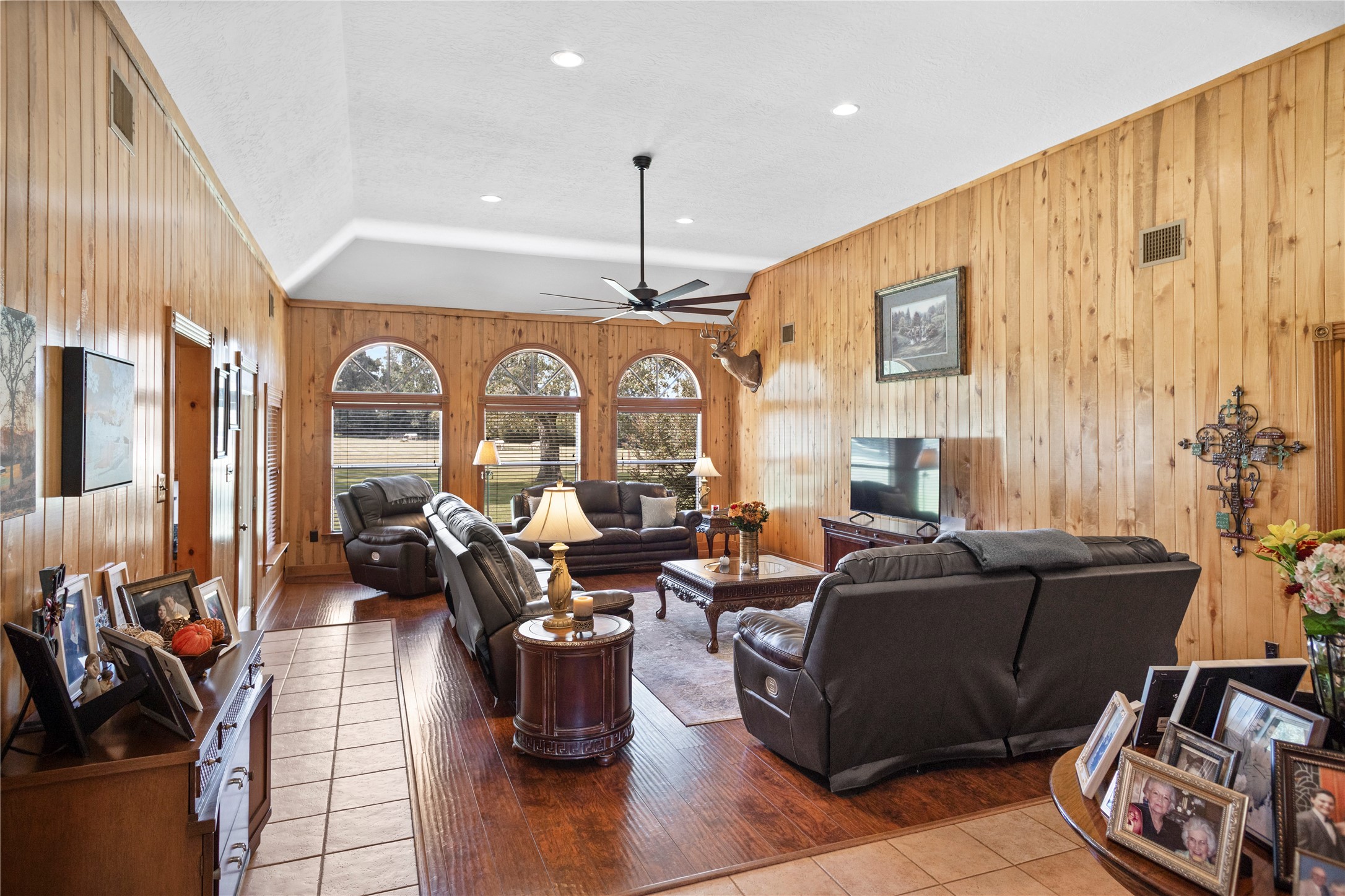 7875 Willys Road New Waverly, TX 77358 - Photo 16 of 45 a living room with fireplace furniture and a large window