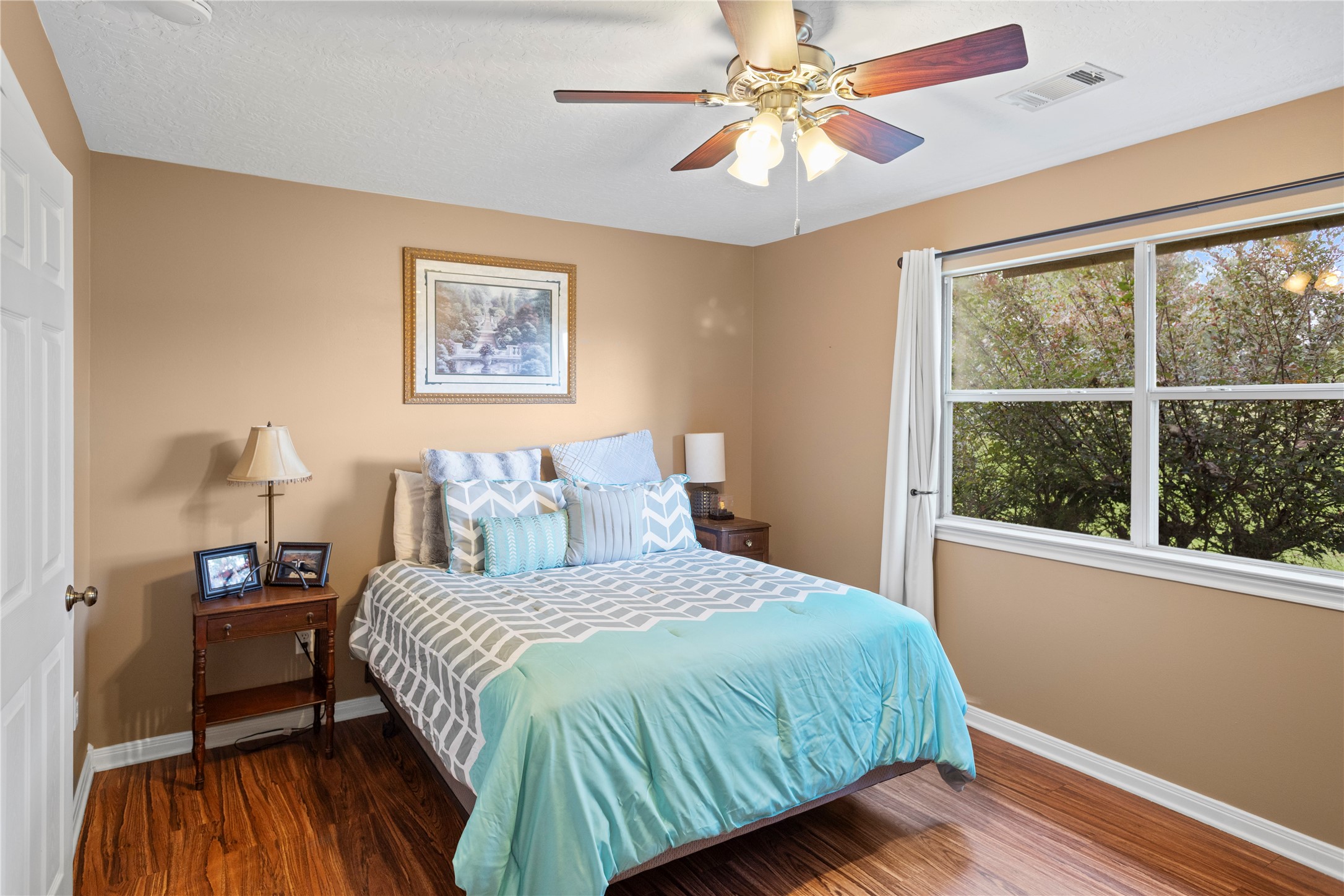 7875 Willys Road New Waverly, TX 77358 - Photo 27 of 45 a bedroom with a bed and a window
