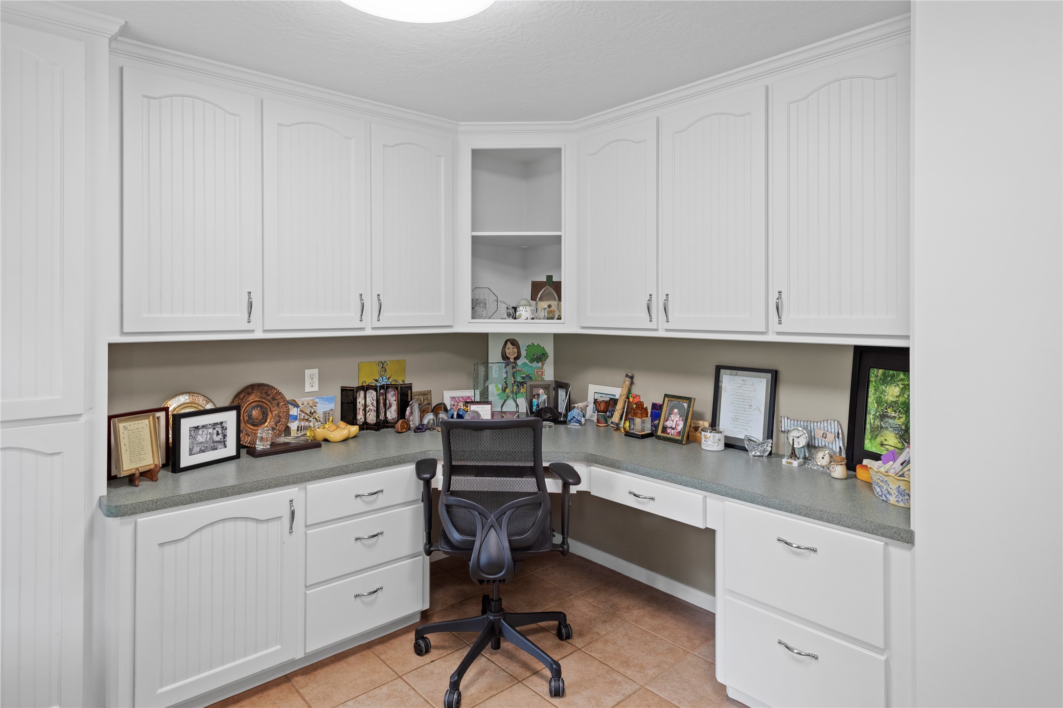 7875 Willys Road New Waverly, TX 77358 - Photo 30 of 45 a kitchen with stainless steel appliances white cabinets and a sink