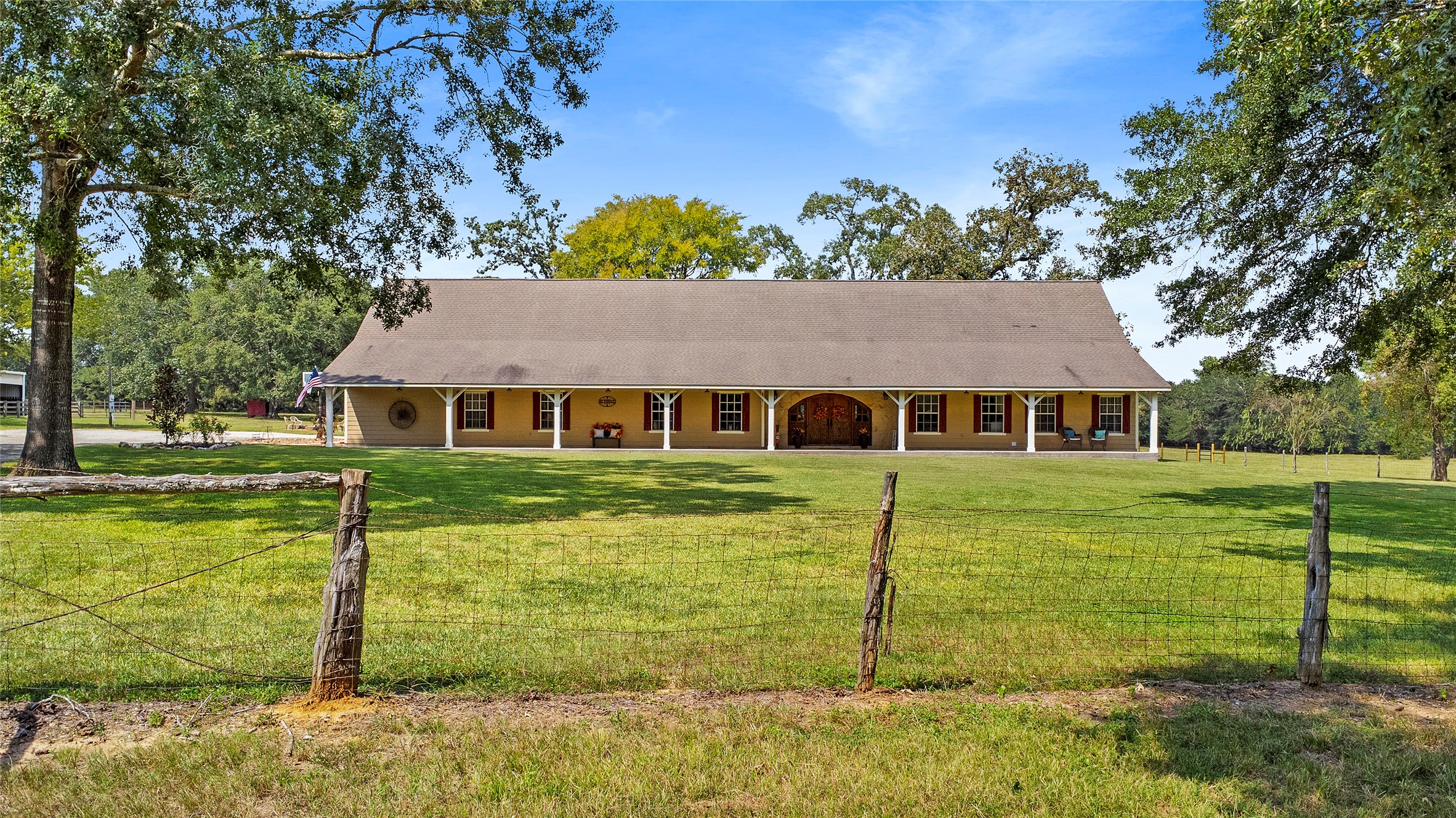 7875 Willys Road New Waverly, TX 77358 - Photo 3 of 45 a view of a house with a yard