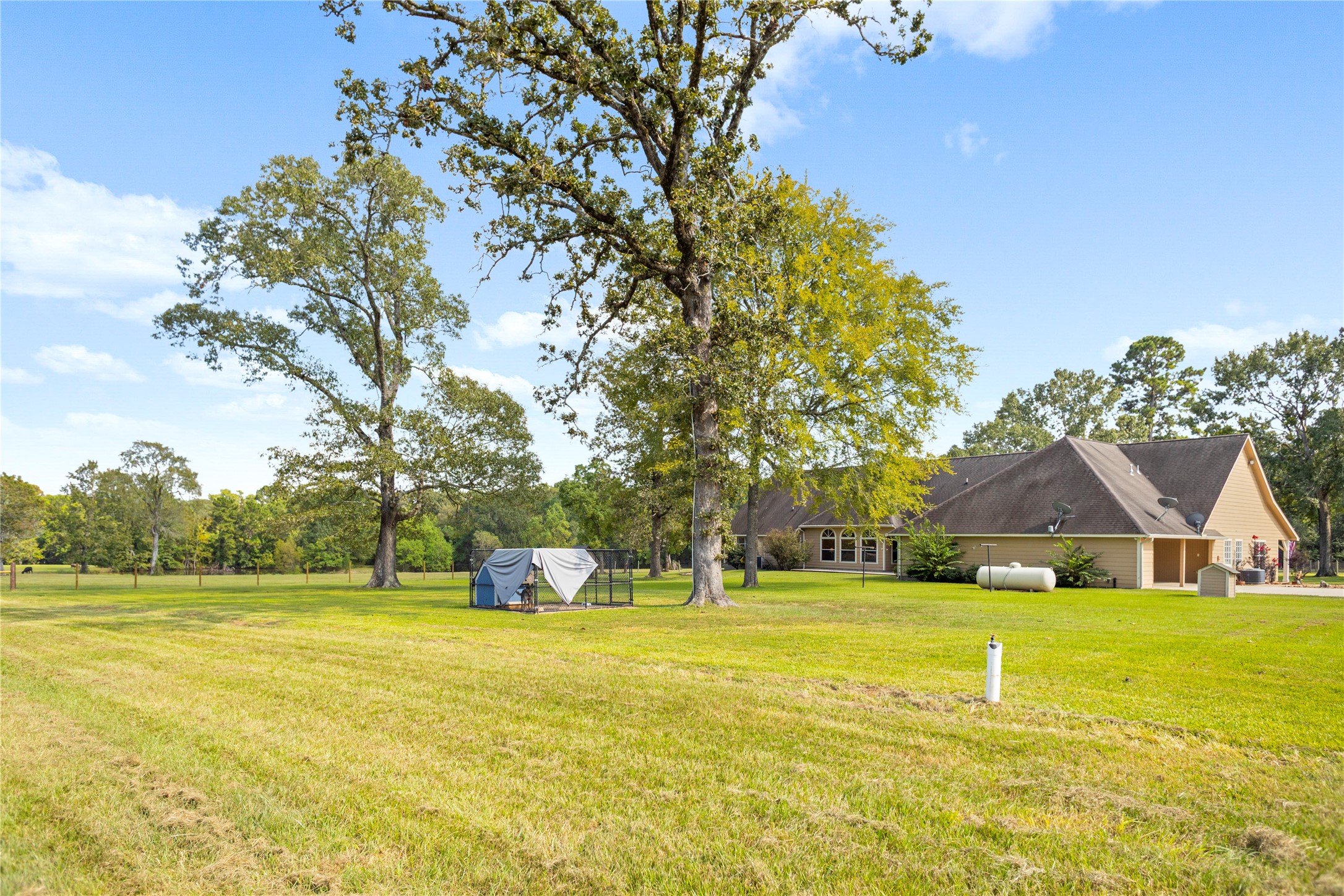 7875 Willys Road New Waverly, TX 77358 - Photo 37 of 45 a house view with swimming pool in front of it