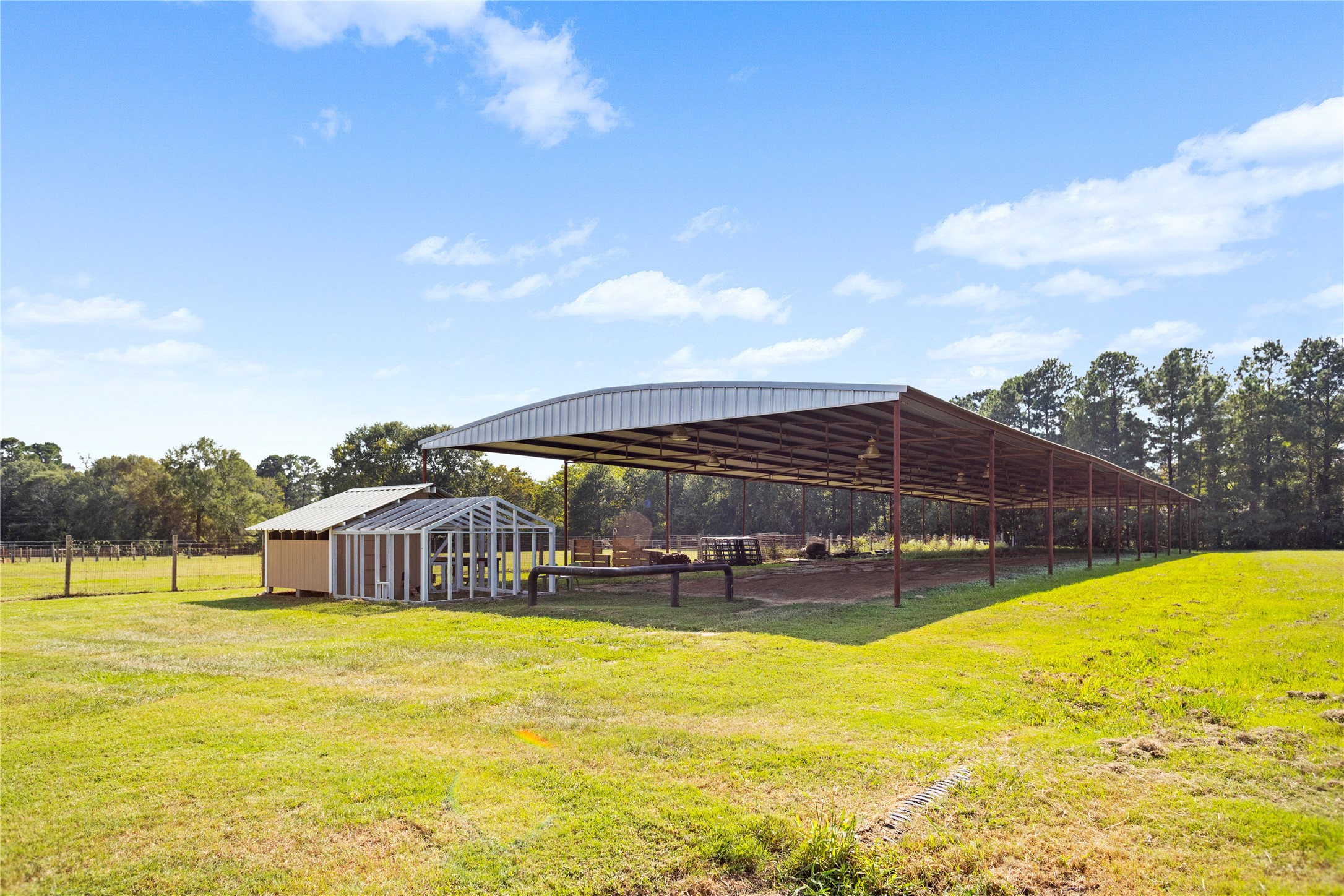 7875 Willys Road New Waverly, TX 77358 - Photo 40 of 45 a view of a swimming pool with an outdoor seating
