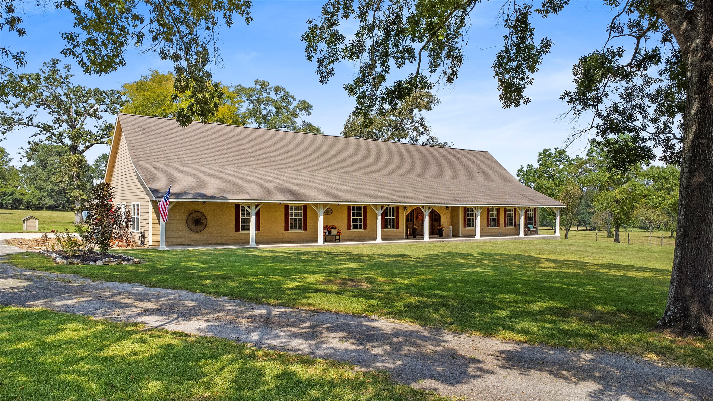 7875 Willys Road New Waverly, TX 77358 - Photo 4 of 45 a front view of a house with a yard
