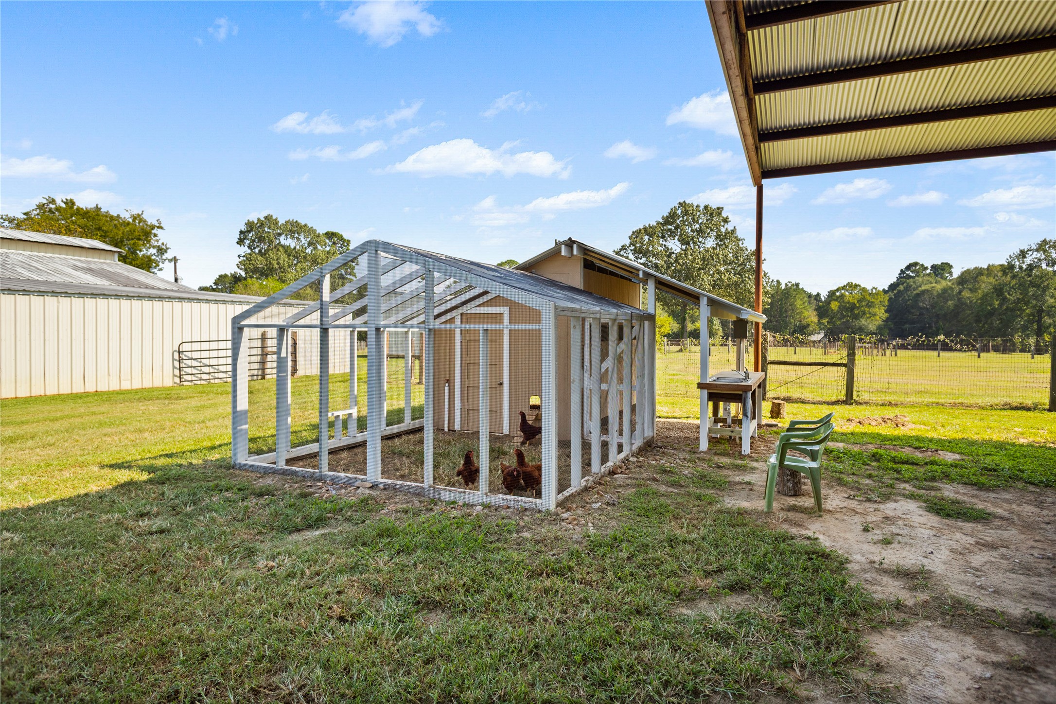 7875 Willys Road New Waverly, TX 77358 - Photo 41 of 45 a view of a house with a yard