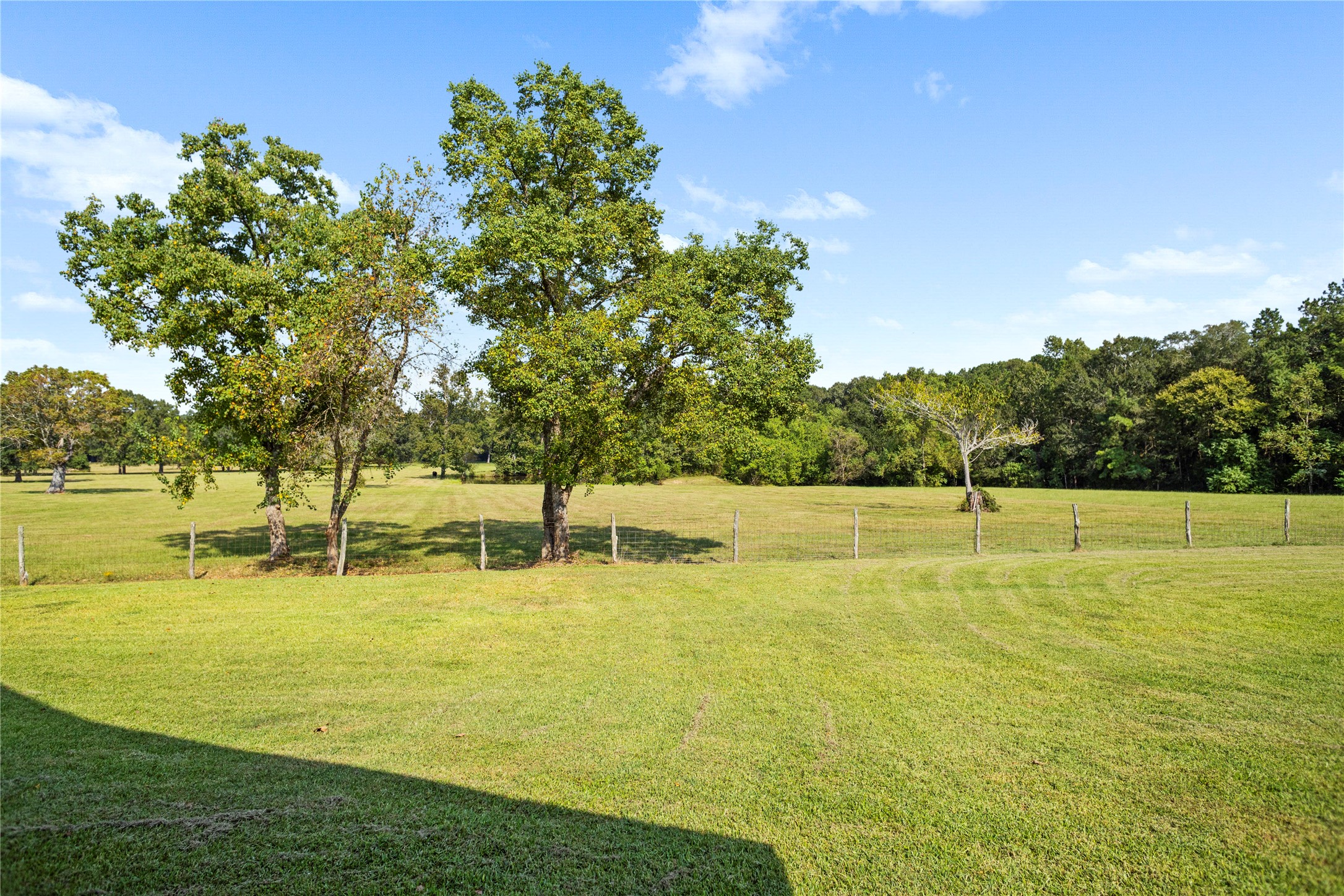 7875 Willys Road New Waverly, TX 77358 - Photo 42 of 45 a view of a swimming pool with an outdoor space and seating area