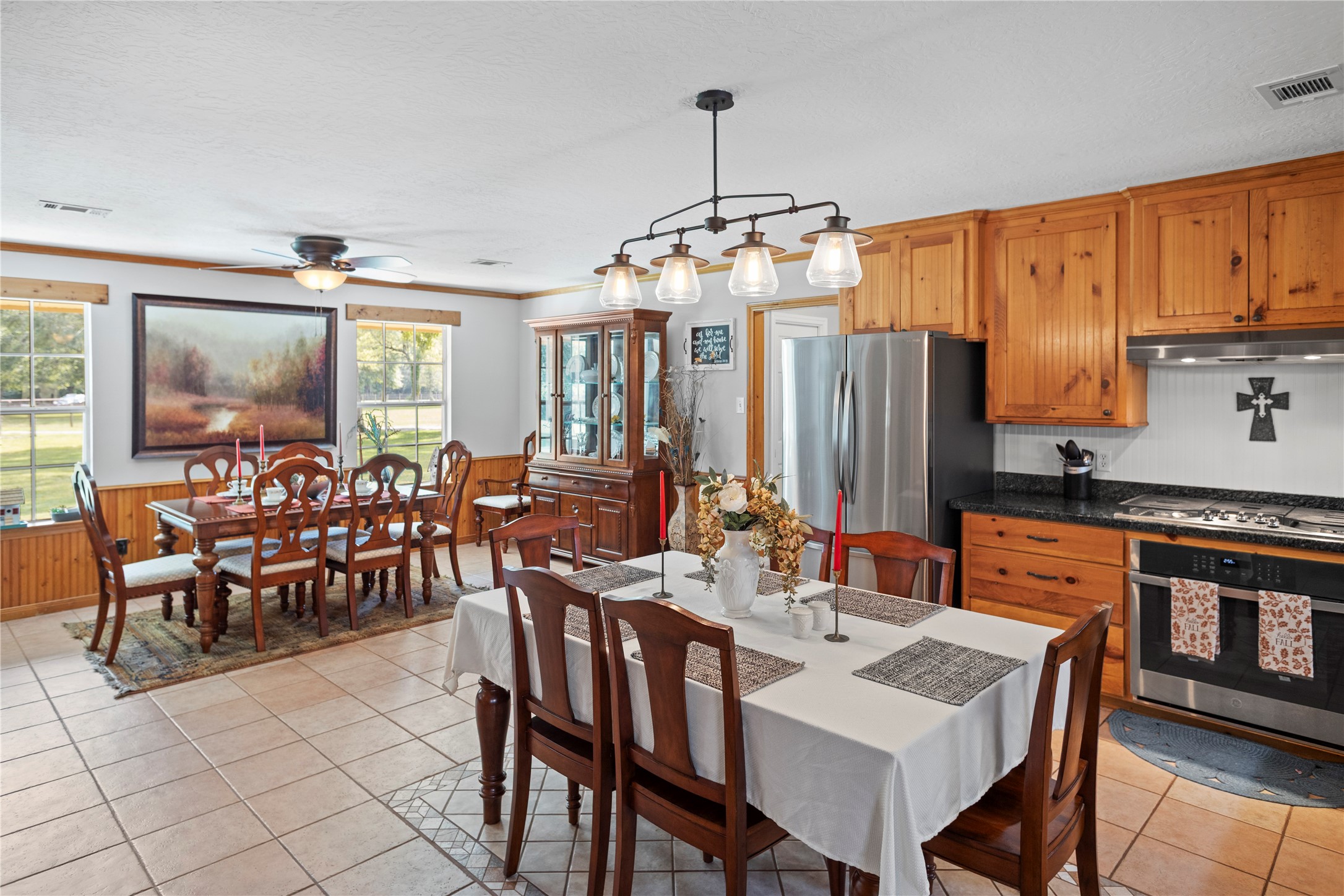 7875 Willys Road New Waverly, TX 77358 - Photo 9 of 45 a view of a dining room with furniture window and outside view