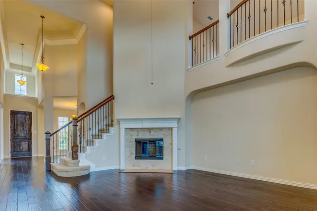 a view of an entryway with wooden floor