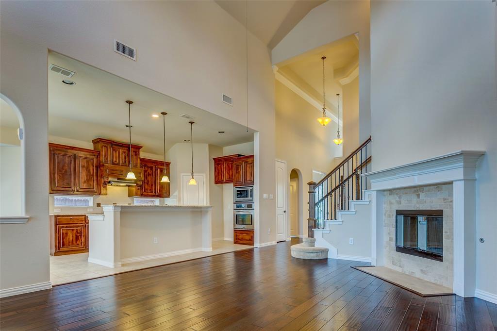 1180 Ranch Gate Lane Frisco, TX 75036 - Photo 12 of 40 a view of kitchen with cabinets and wooden floor
