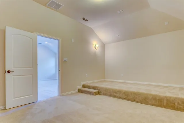 an empty room with an entryway