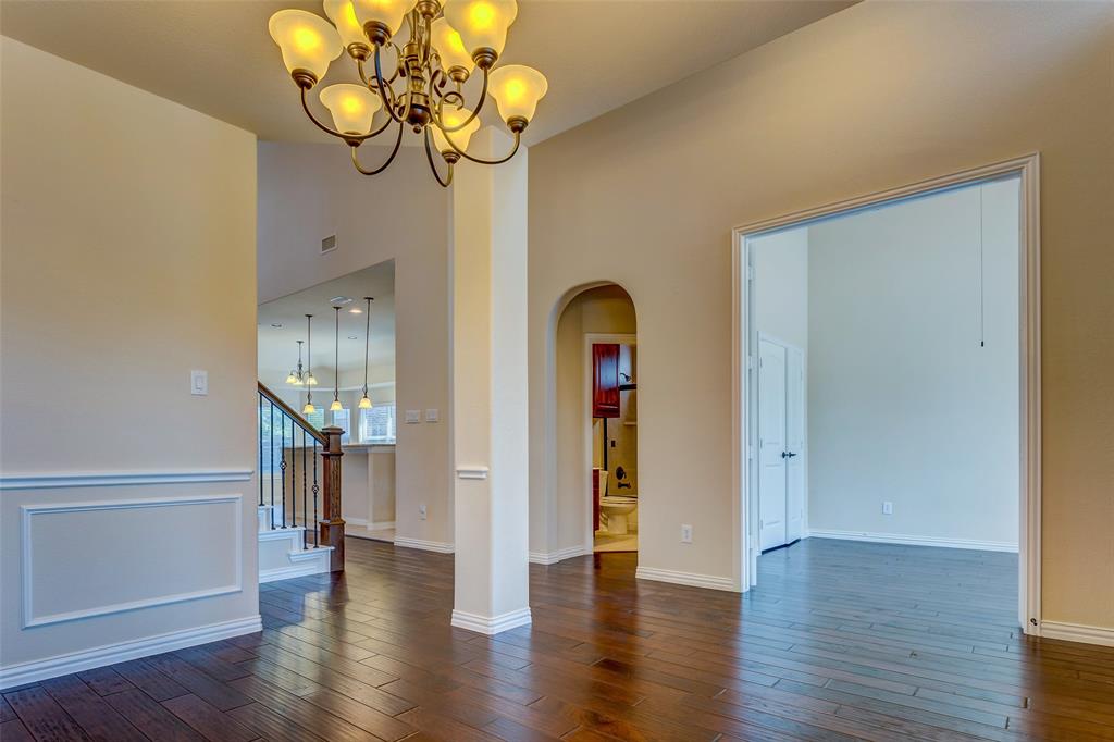 1180 Ranch Gate Lane Frisco, TX 75036 - Photo 4 of 40 a view of an entryway with wooden floor