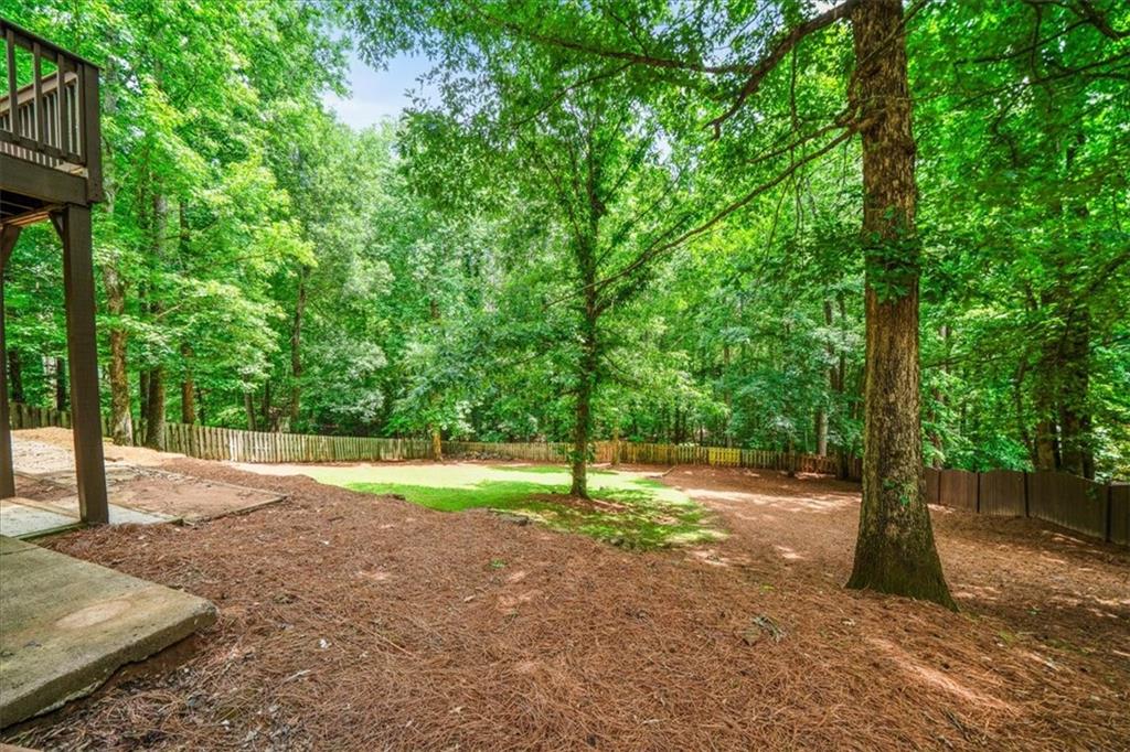 1710 Rising Mist Lane Cumming, GA 30041 - Photo 105 of 111 a view of outdoor space with deck and yard