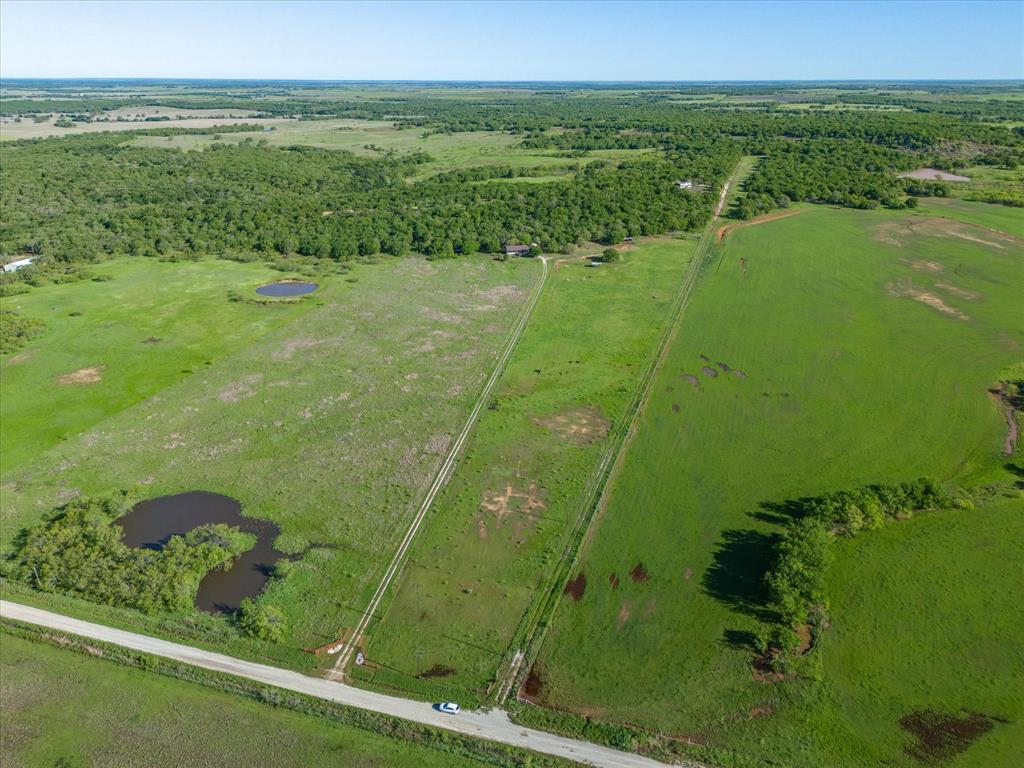 3760 Dewebber Road Bowie, TX 76230 - Photo 33 of 35 a view of a lake from a balcony