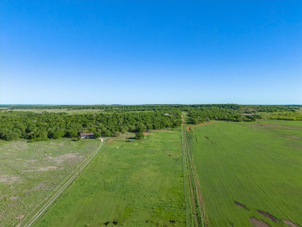 3760 Dewebber Road Bowie, TX 76230 - Photo 34 of 35 a view of a green field with clear sky