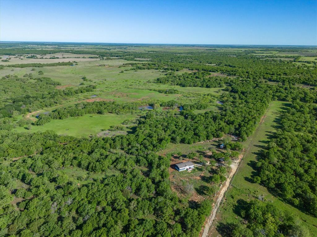 3760 Dewebber Road Bowie, TX 76230 - Photo 5 of 35 a view of a field with an ocean view