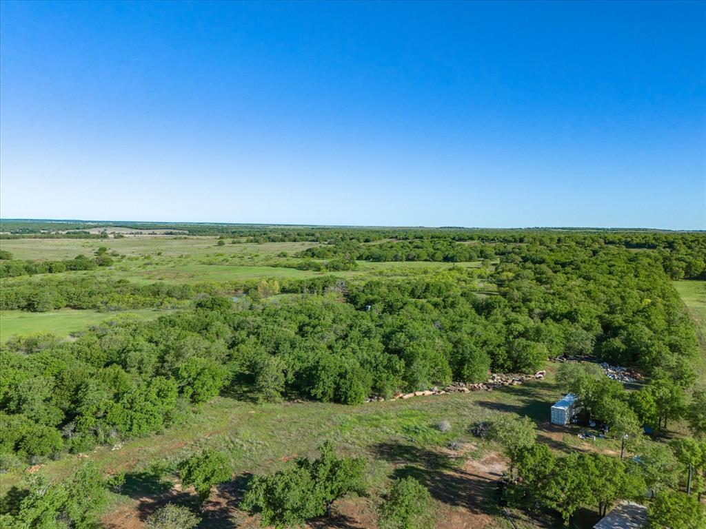 3760 Dewebber Road Bowie, TX 76230 - Photo 9 of 35 a view of a field with an outdoor space