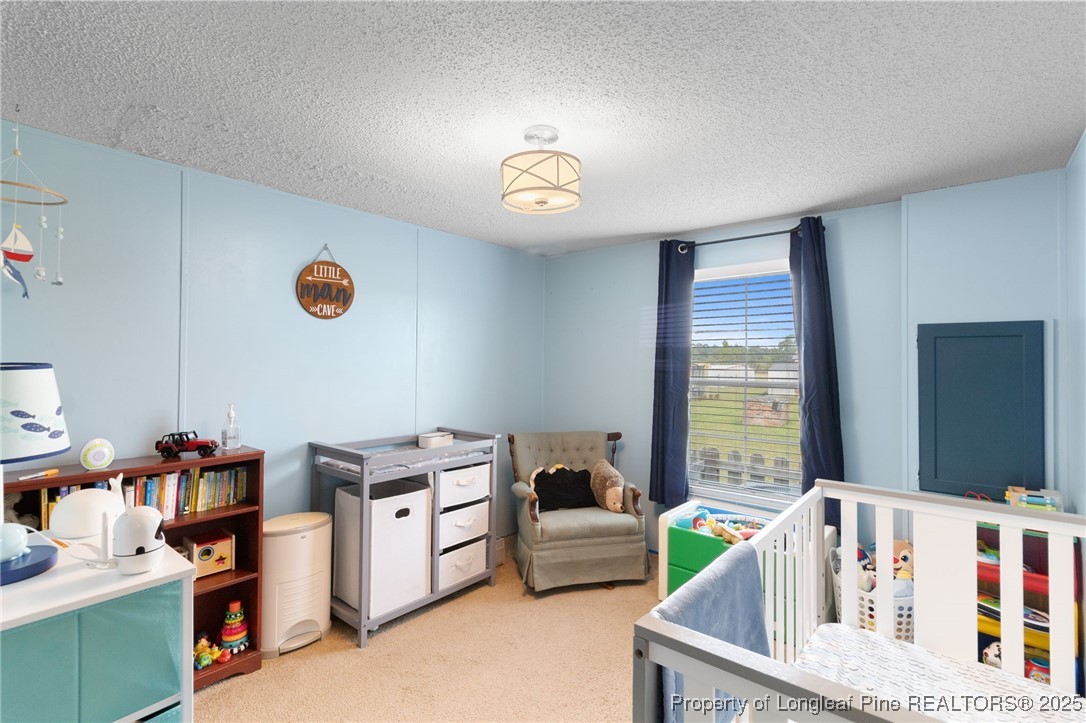 3376 Wade-Stedman Road Wade, NC 28395 - Photo 19 of 35 a view of kitchen filled with furniture and window