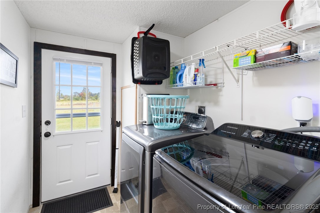 3376 Wade-Stedman Road Wade, NC 28395 - Photo 25 of 35 a kitchen with a sink and a stove top oven