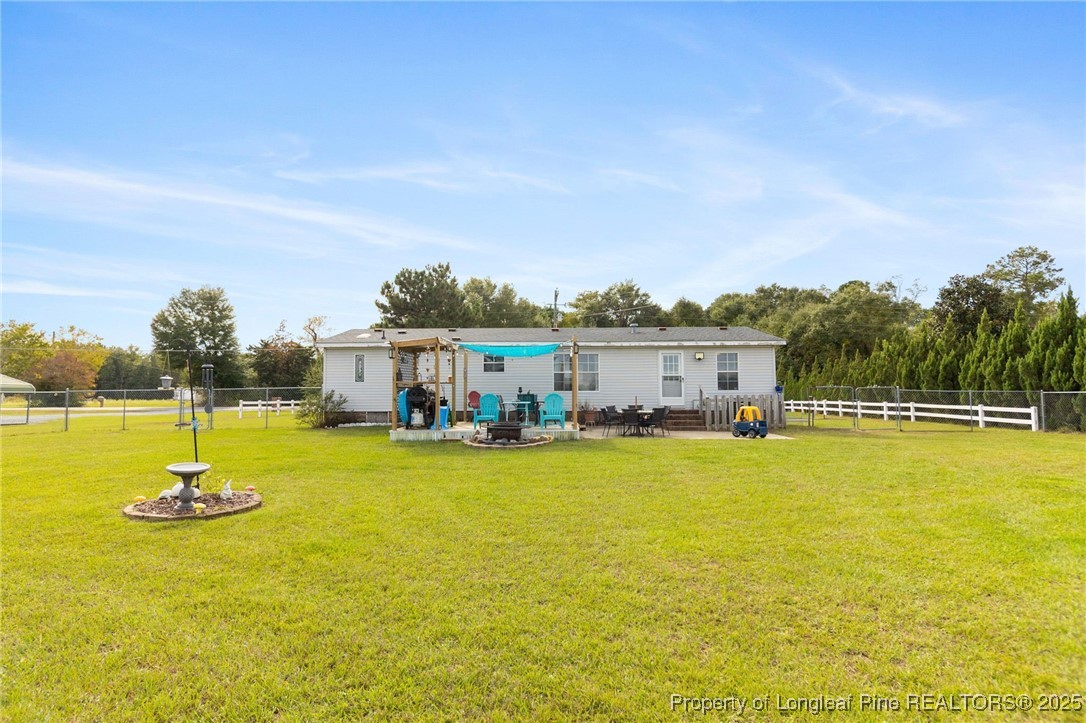 3376 Wade-Stedman Road Wade, NC 28395 - Photo 31 of 35 a view of a swimming pool with a yard