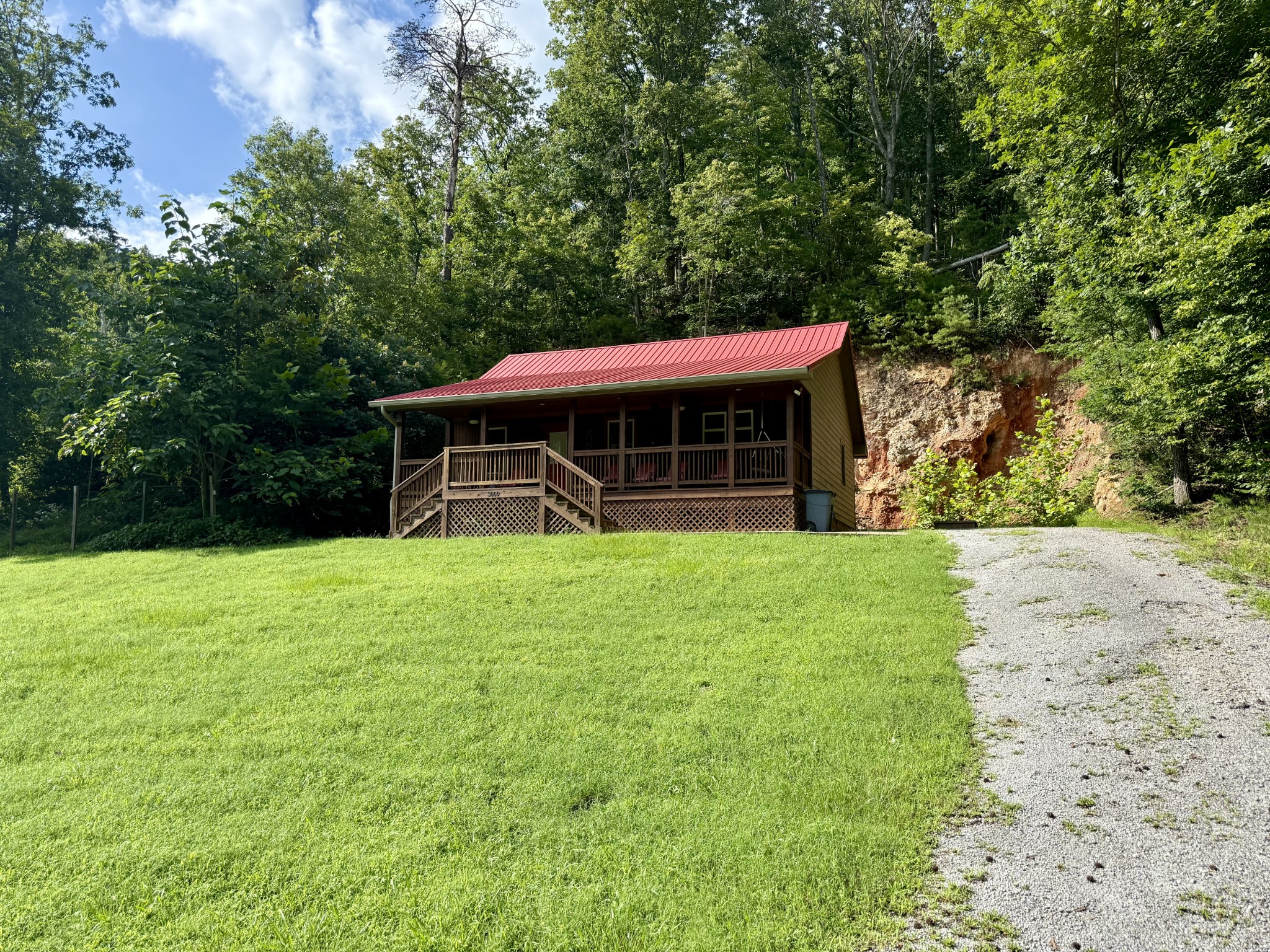 3000 Highwater Road Waverly, TN 37185 - Photo 24 of 26 a view of a house with a yard