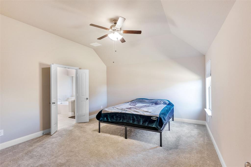 312 Eagle Ridge Road Forney, TX 75126 - Photo 20 of 39 a living room with furniture and chandelier