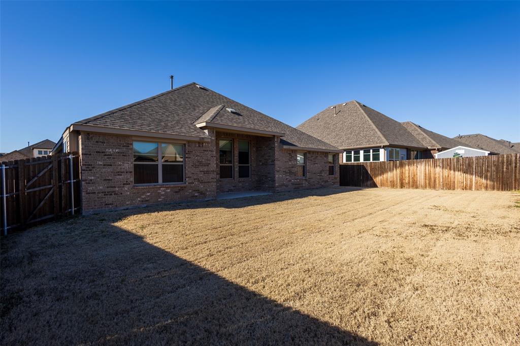 312 Eagle Ridge Road Forney, TX 75126 - Photo 23 of 39 a front view of a house with yard